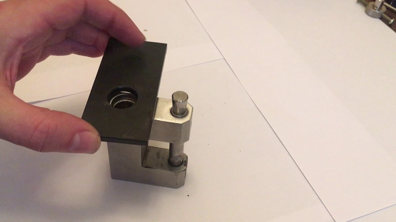 10 Disc Detainer padlock opened with lock puller