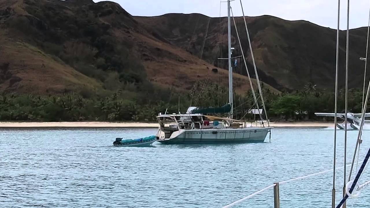 Seaplane landing and taking off in Fiji amongst boats