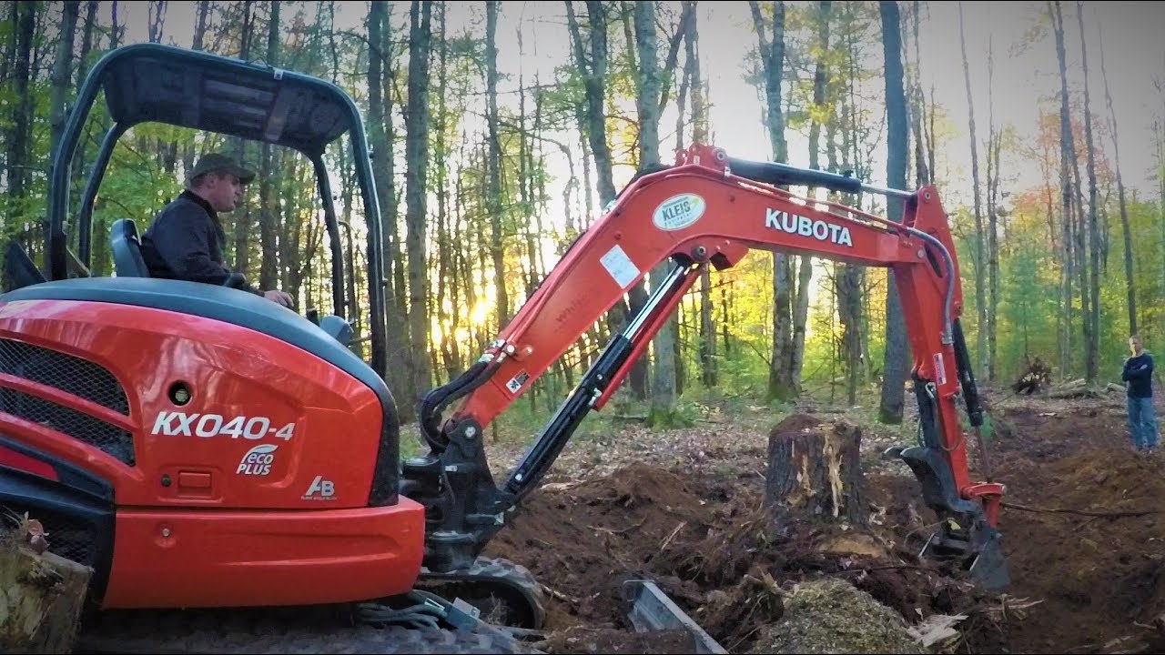Kubota KX 040-4 Tackling A Big Stump