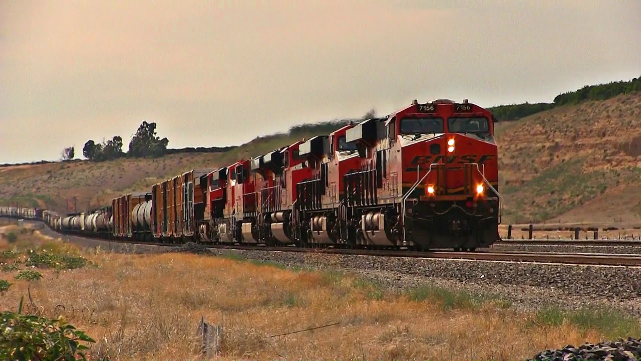 Four BNSF Freight Trains On The Mojave Sub in Bena, California