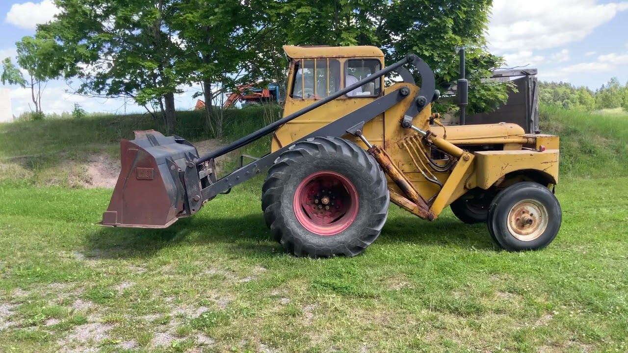 Köp Baklastare Volvo BM H10 med skopa och gafflar på Klaravik