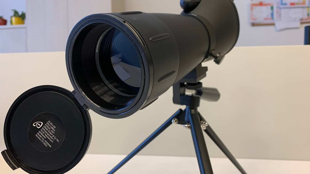 AUROL Spotting Scope 20-60x60 with a mobile phone holder on the eyepiece