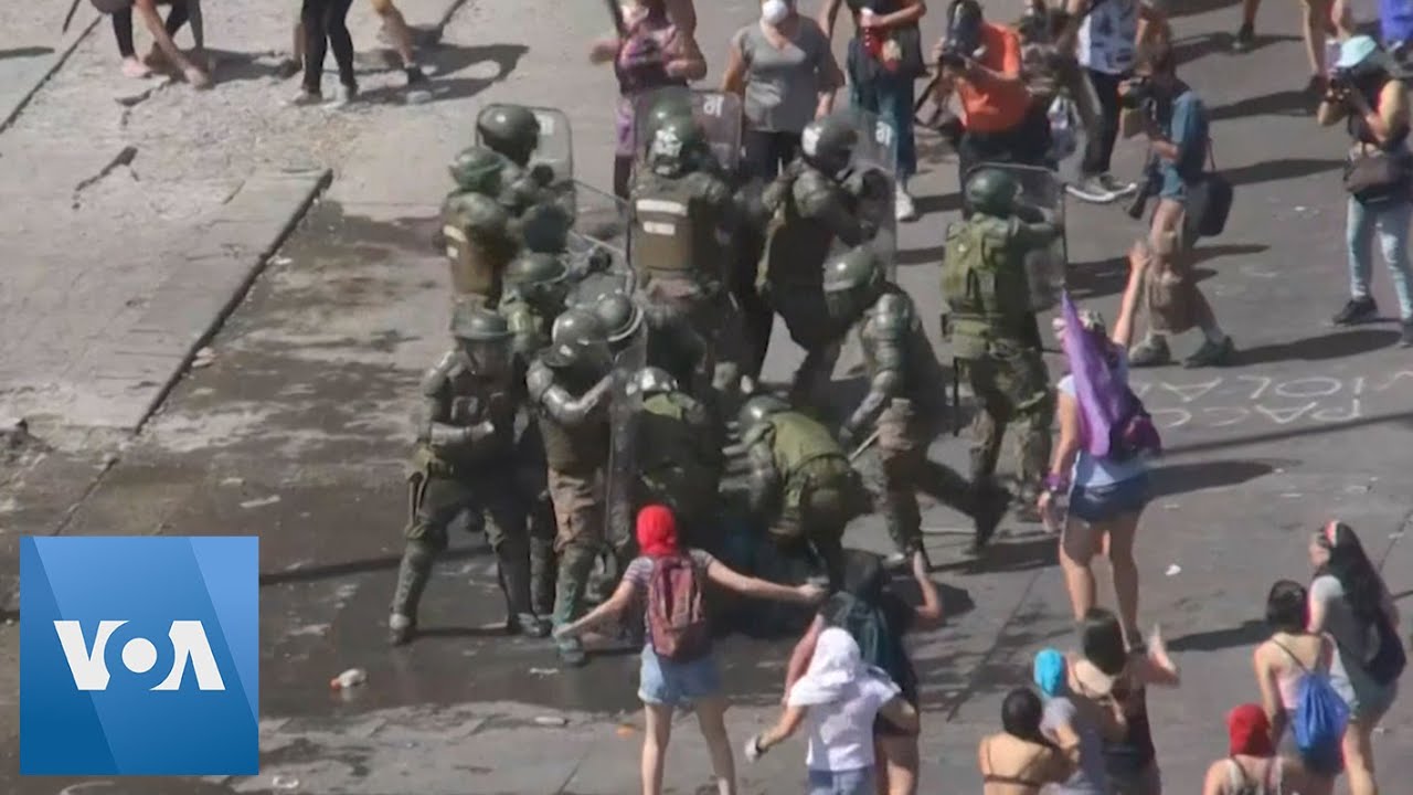 Police Clash with Protesters During International Women's Day March in Santiago, Chile