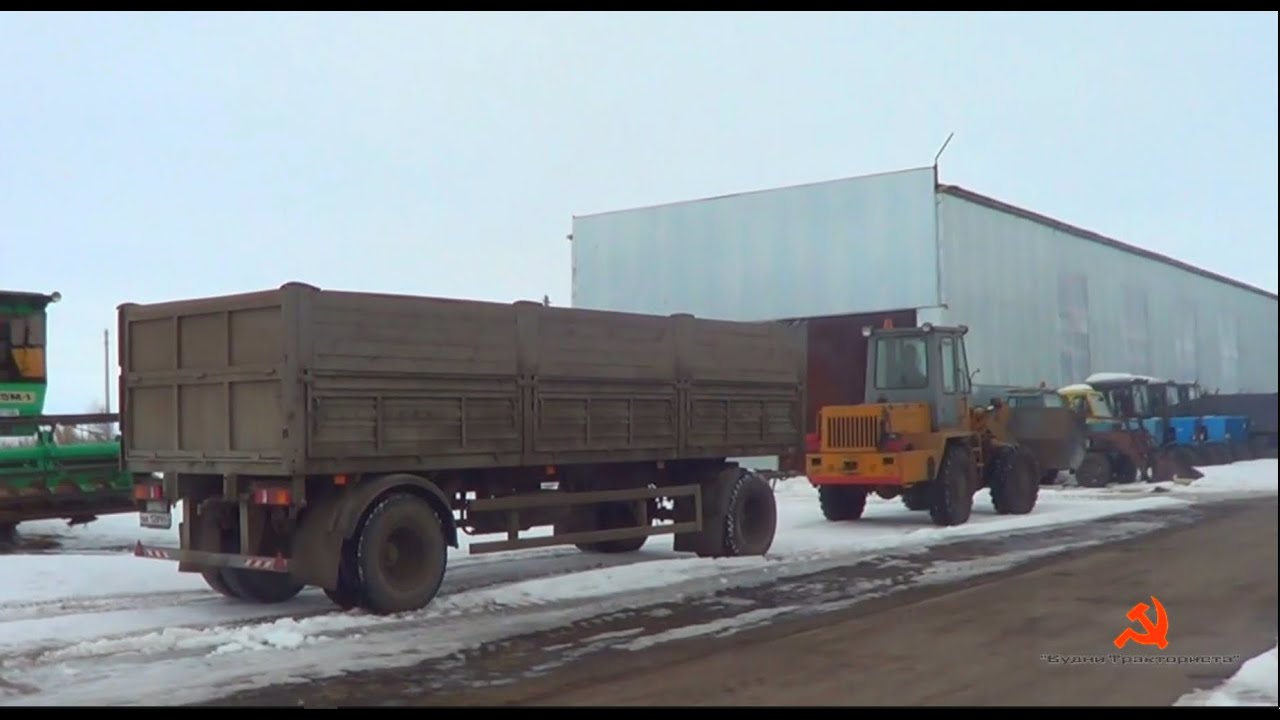 Отгрузка зерна на продажу погрузчиком ТО-30, в грузовики КамАЗ и МАЗ. Поломка приезжего МАЗа.