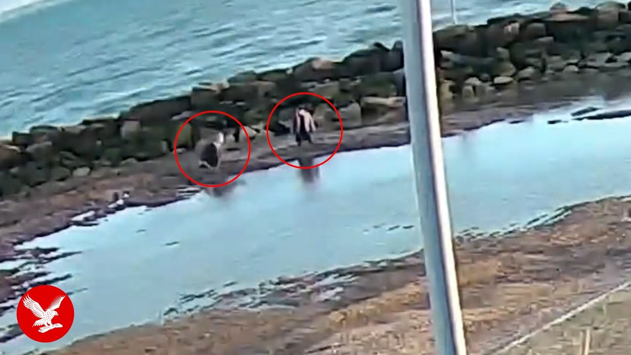 Moment mother and daughter rescued from waist-high sinking sand