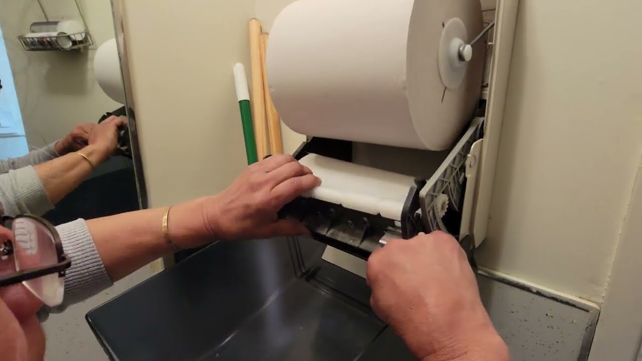 How to Refill a Bathroom Paper Towel Dispenser with a Roll-Style