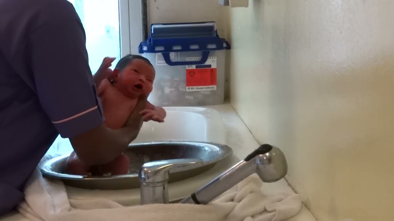 Newborn's first bath - India