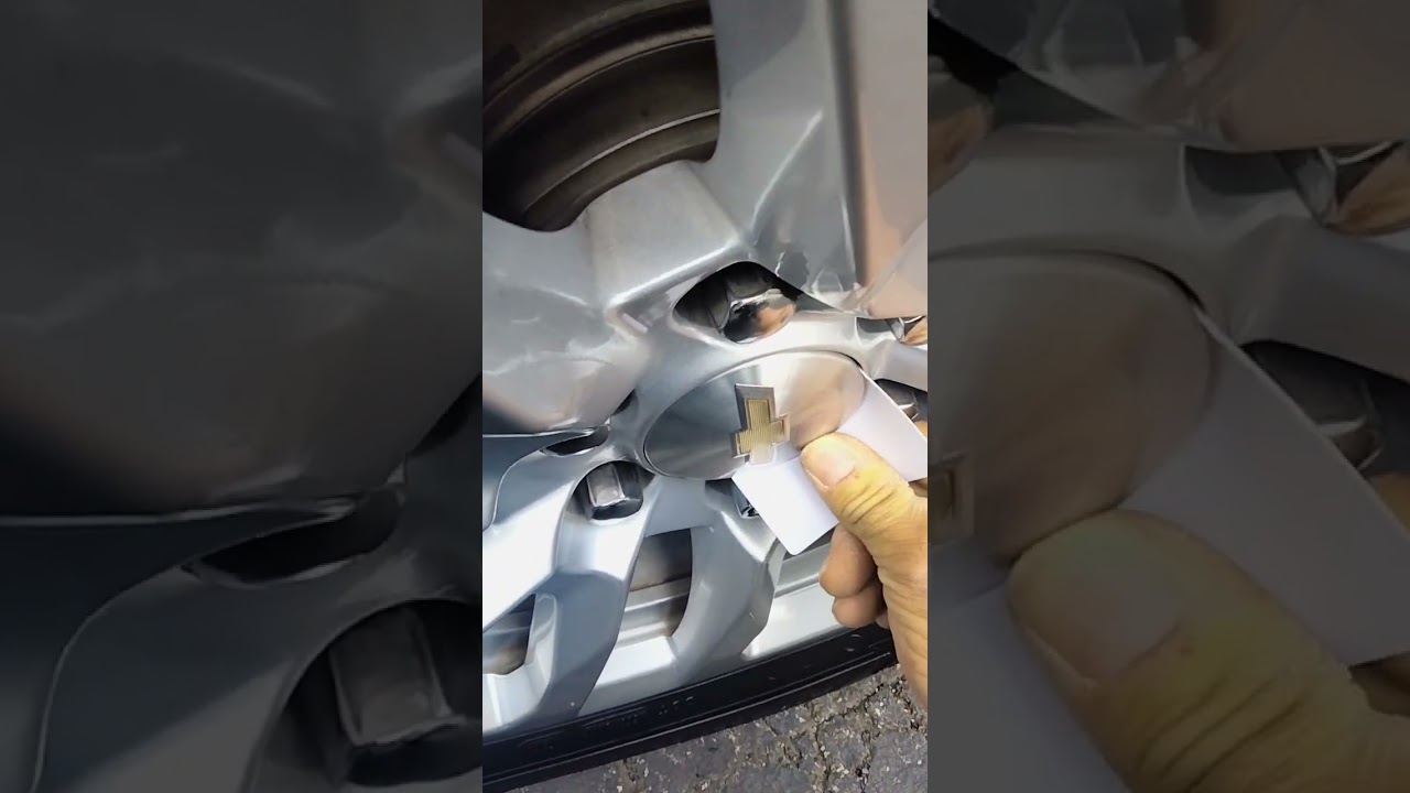 Chevy Silverado center cap removal without rim removal "credit card trick"