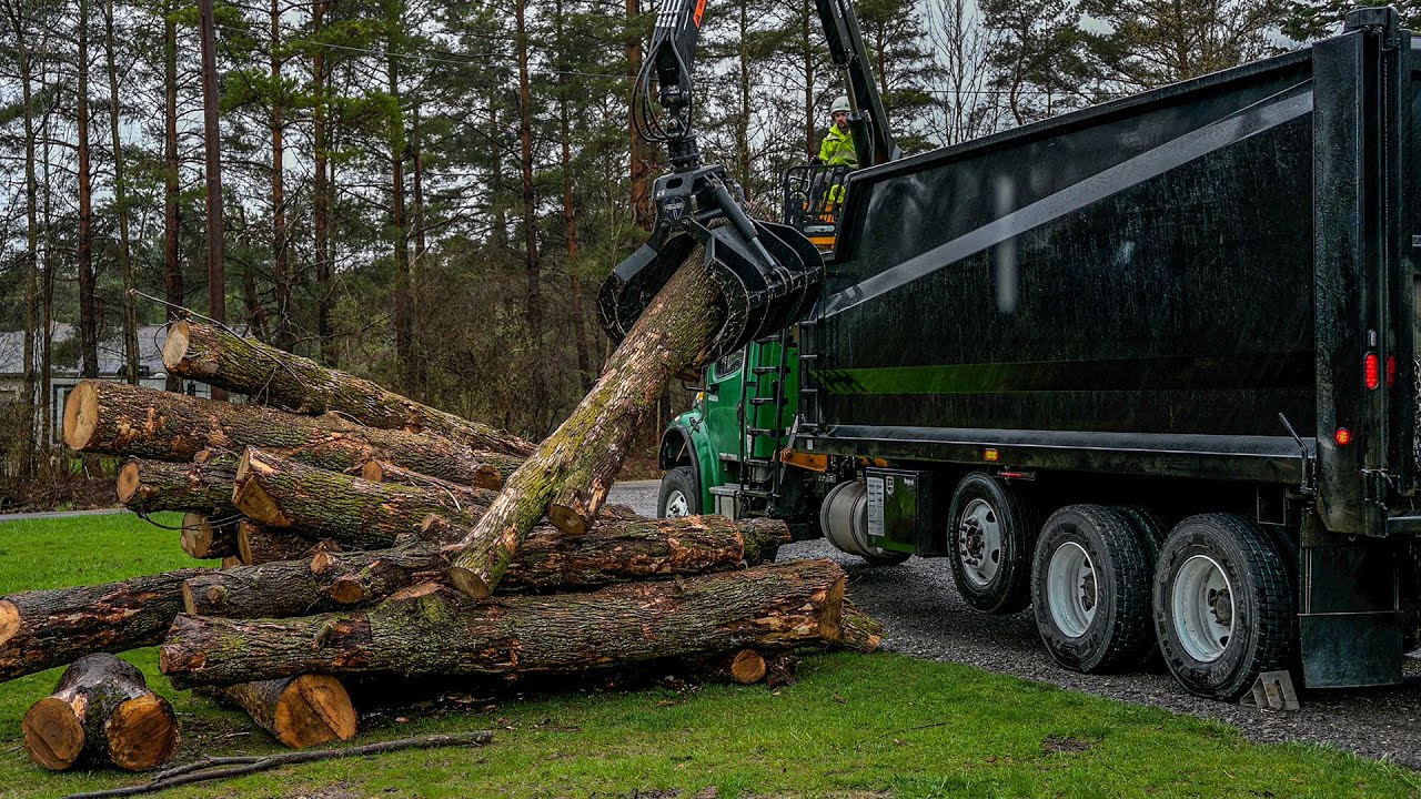 Unloading a $500,000 Grapple Truck - 4K