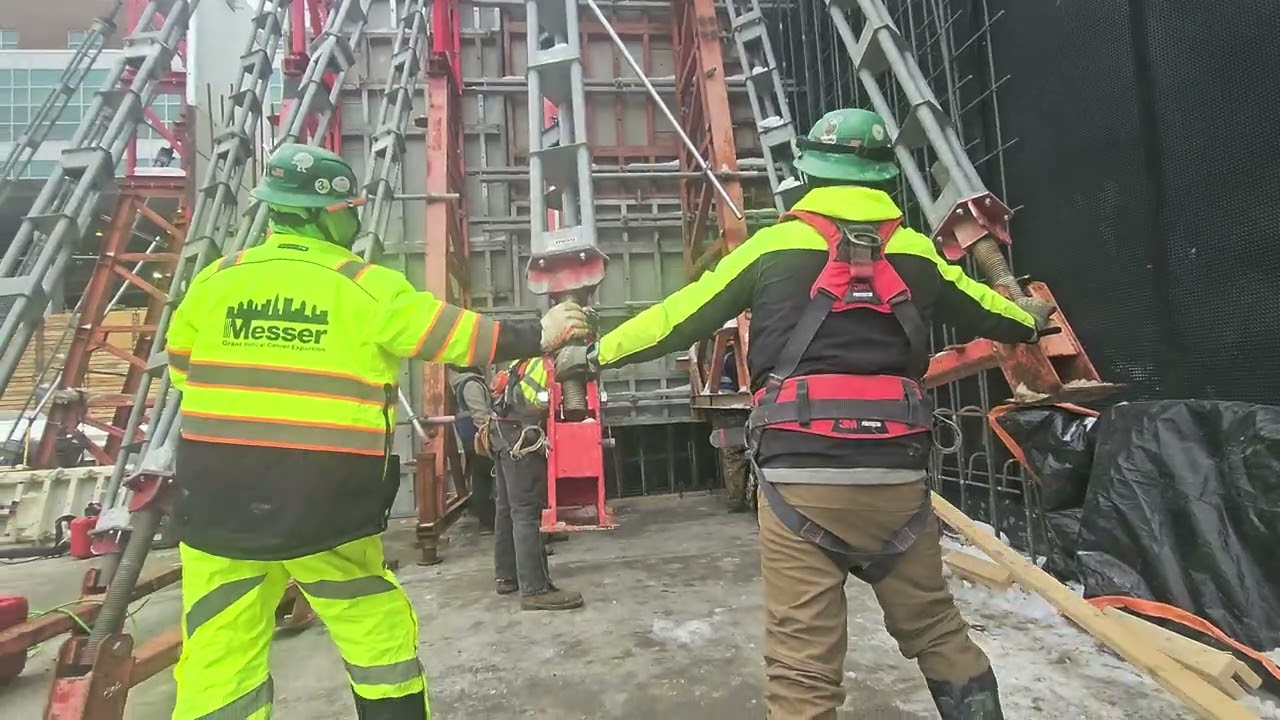 Positioning large panels to eventually pour concrete walls