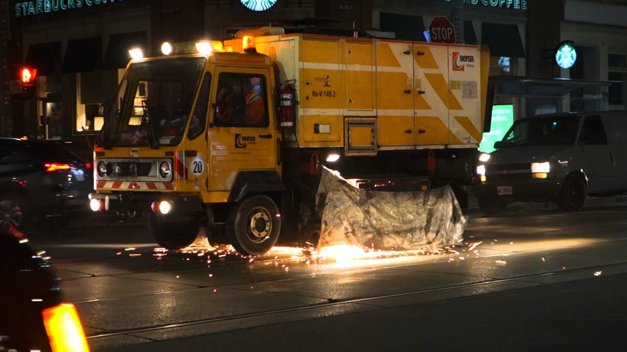 TTC  - Streetcar track rail grinding on College Street.