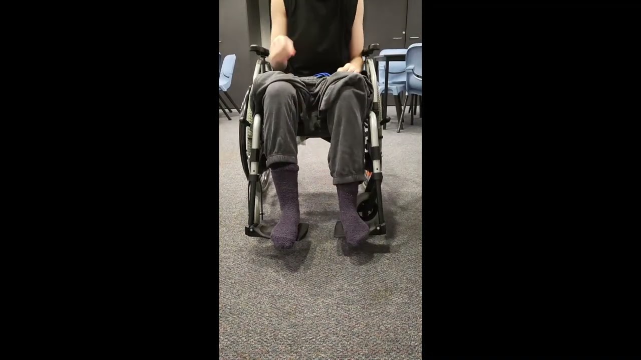 Donning Pants Seated in Wheelchair Paraplegic