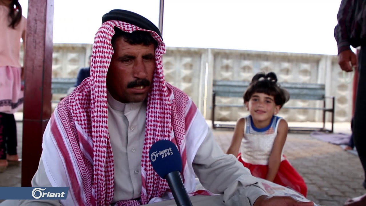عائلات نازحة بمركز الإيواء المؤقت 
