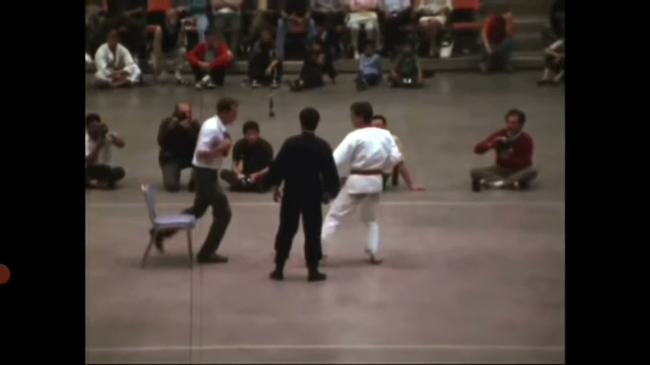 Bruce Lee's 6 inch punch compared to Joe Lewis's punch. (bruce lee shows off his 1 inch punch)