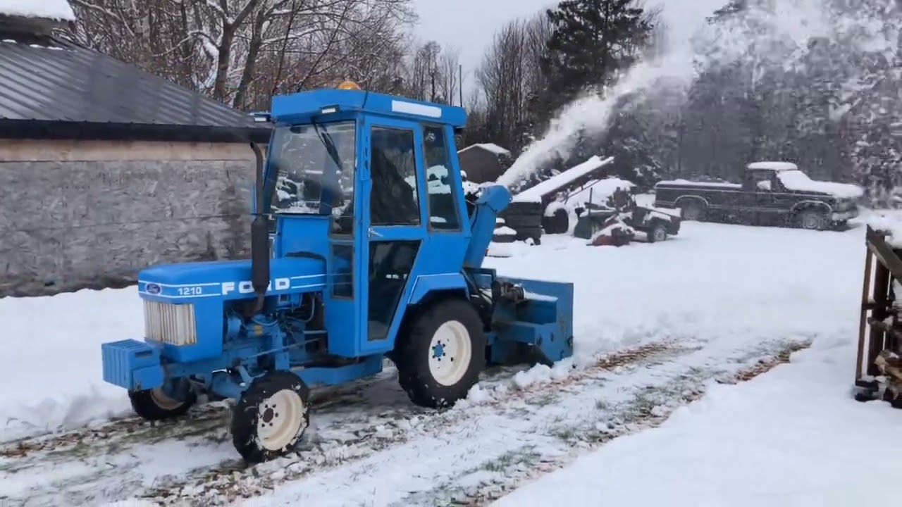 1985 Ford 1210 compact tractor snow removal.