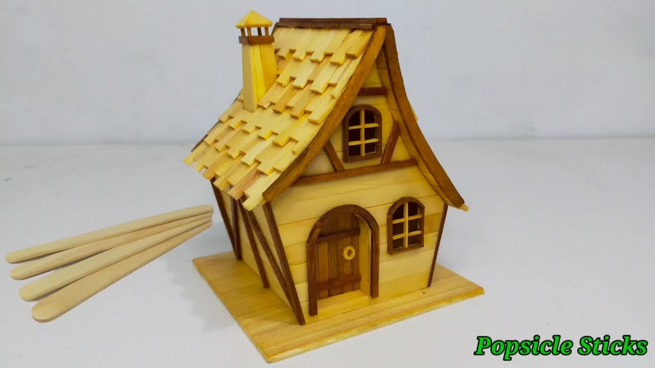 Making fantasy house from popsicle sticks