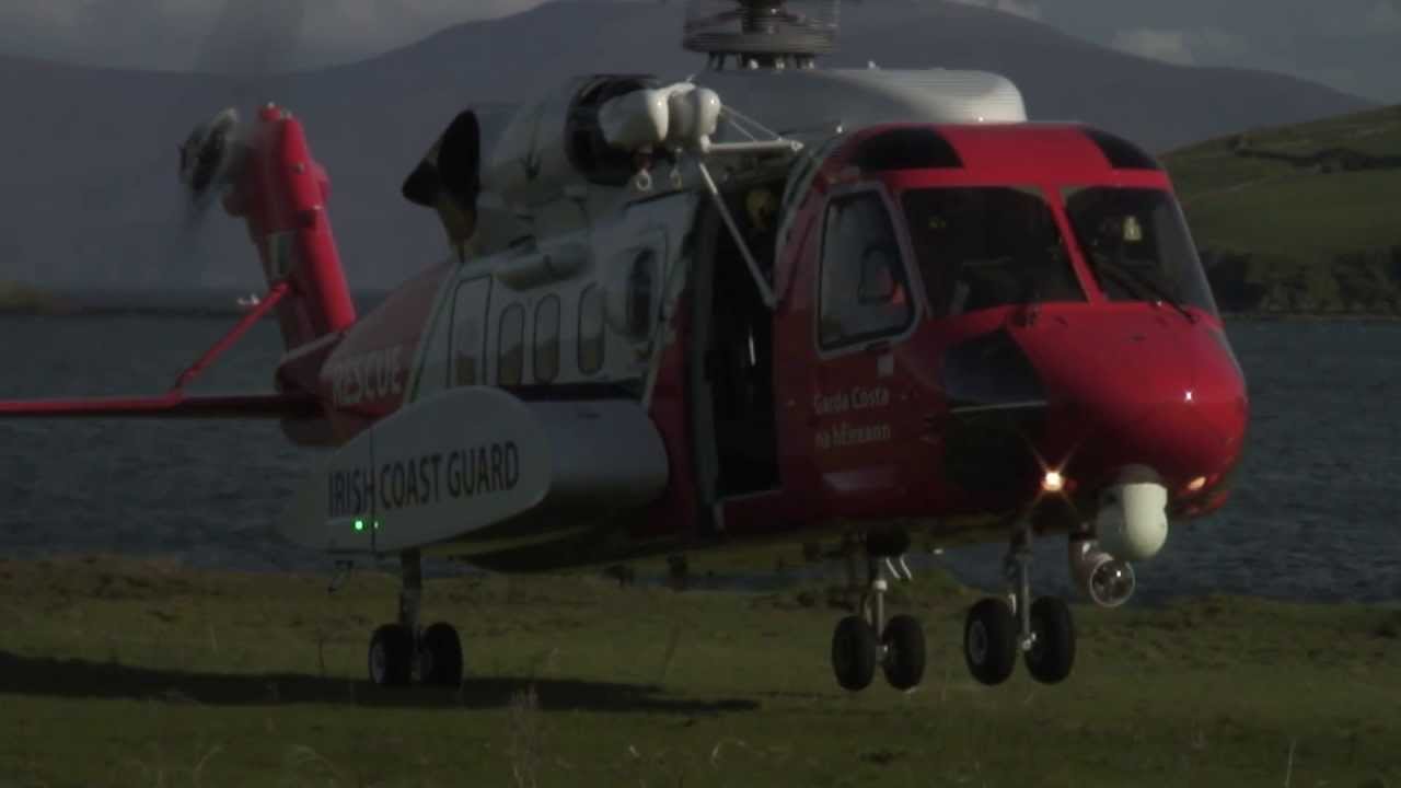 JSAR 2013 flag is delivered via an Irish Coast Guard helicopter, Dingle, County Kerry.
