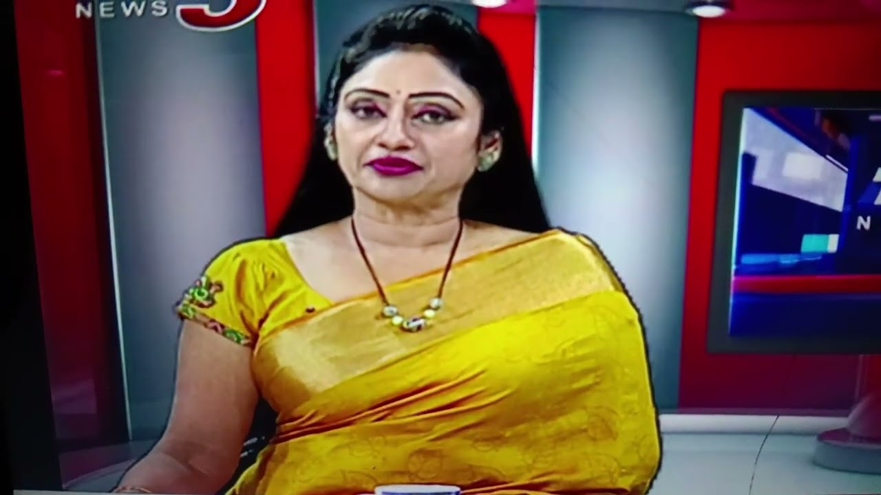 Beautiful Newsreader Kalyani in Yellow Saree 