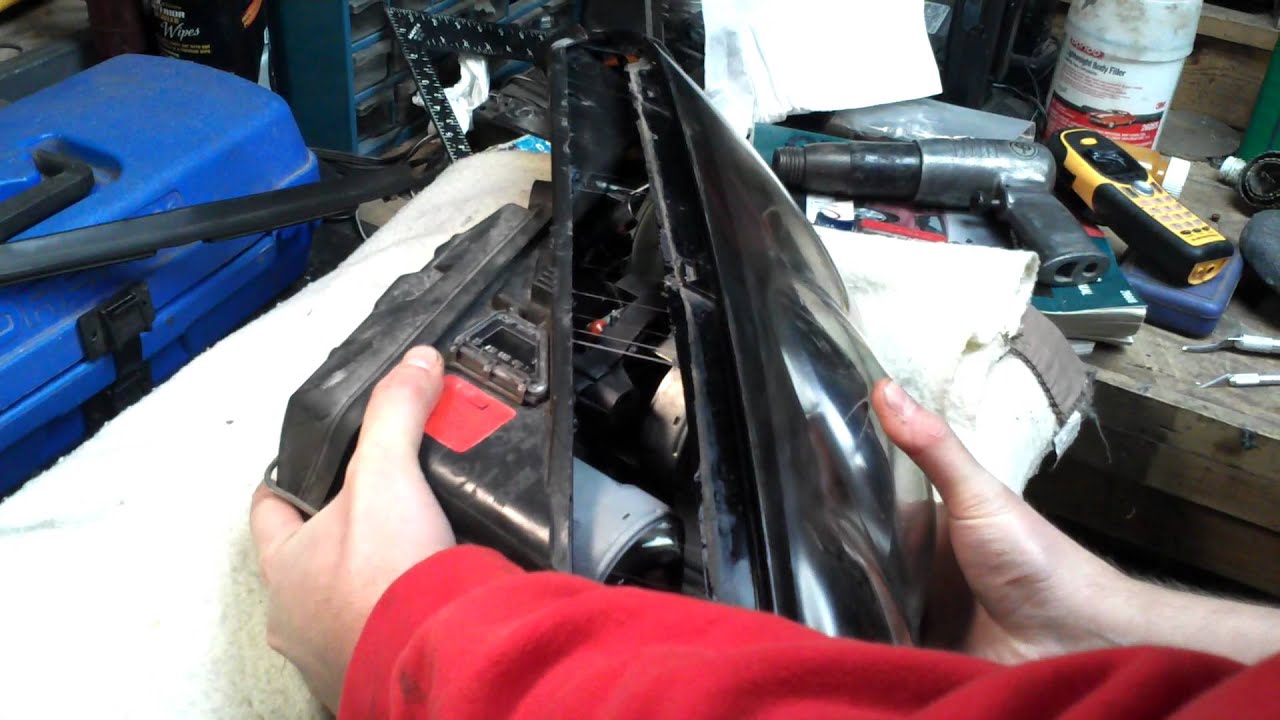 Disassemble a Mercury Cougar Headlight