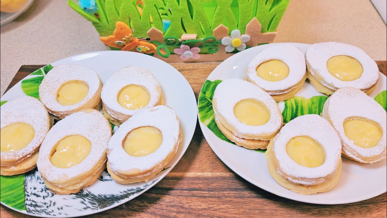 Wielkanocne kruche ciasteczka w kształcie jajek z pysznym domowym kremem cytrynowym (lemon curd).