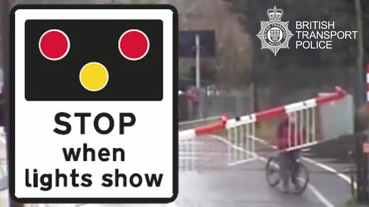 Caught on camera: cyclist traps himself between level crossing barriers at Cambridge