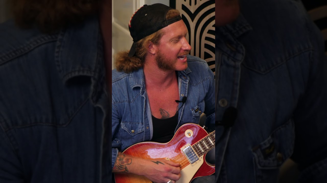 How is he playing guitar like that?!