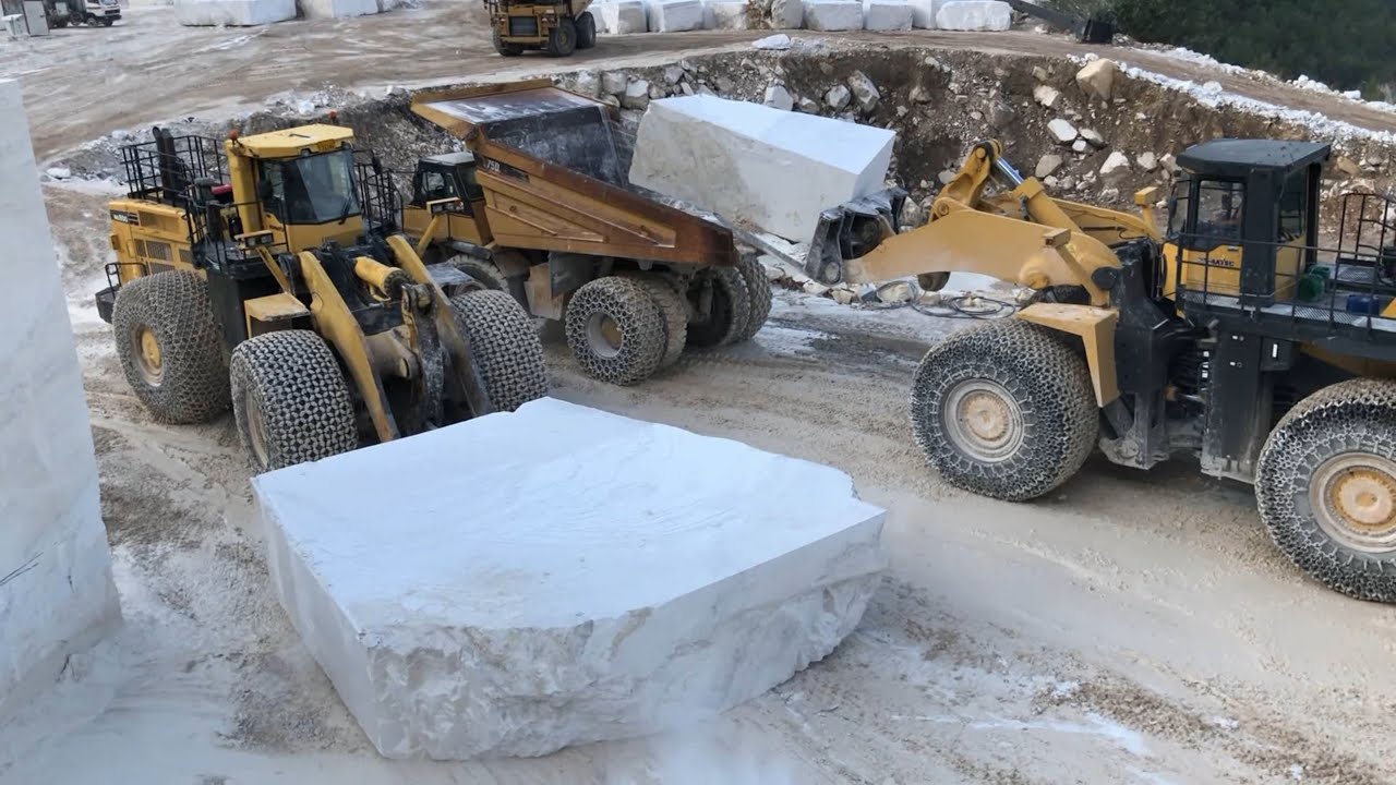 Komatsu WA900 And Komatsu WA800 Wheel Loaders Working On Marble Quarries