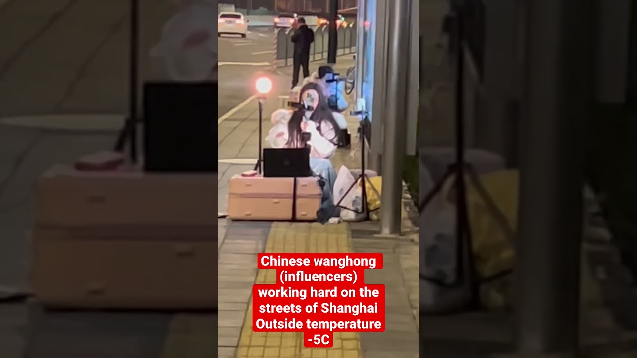Chinese influencers (wanghong) working hard on the streets of Shanghai
