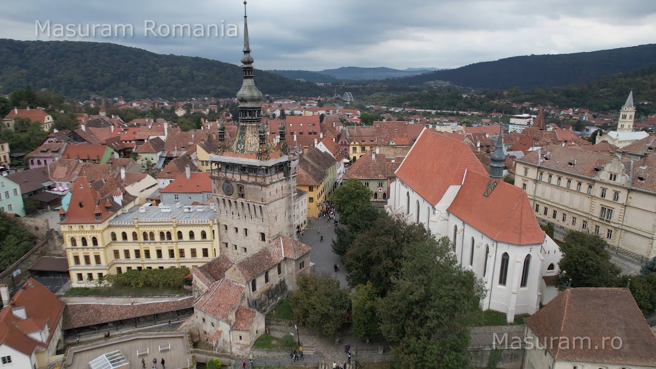 Cinematic flight over Sighisoara, Romania, 4K calm, serene music