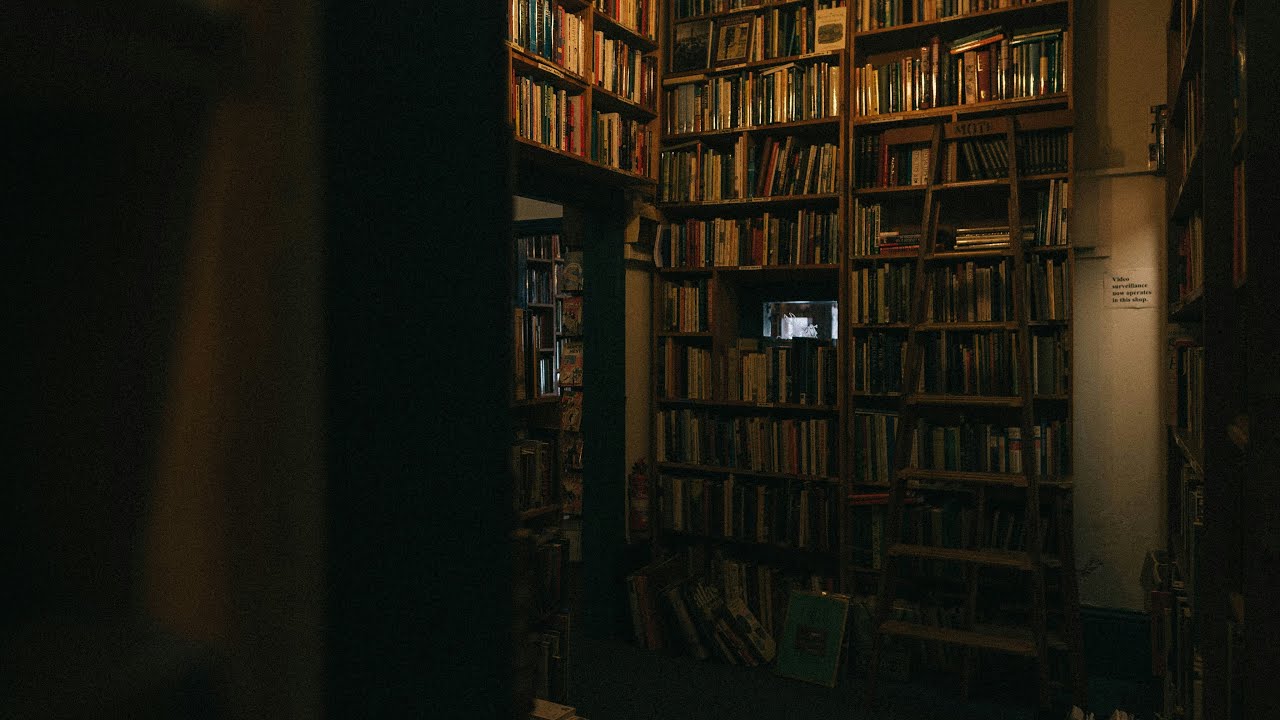 when you drown yourself in books to escape real life | dark academia