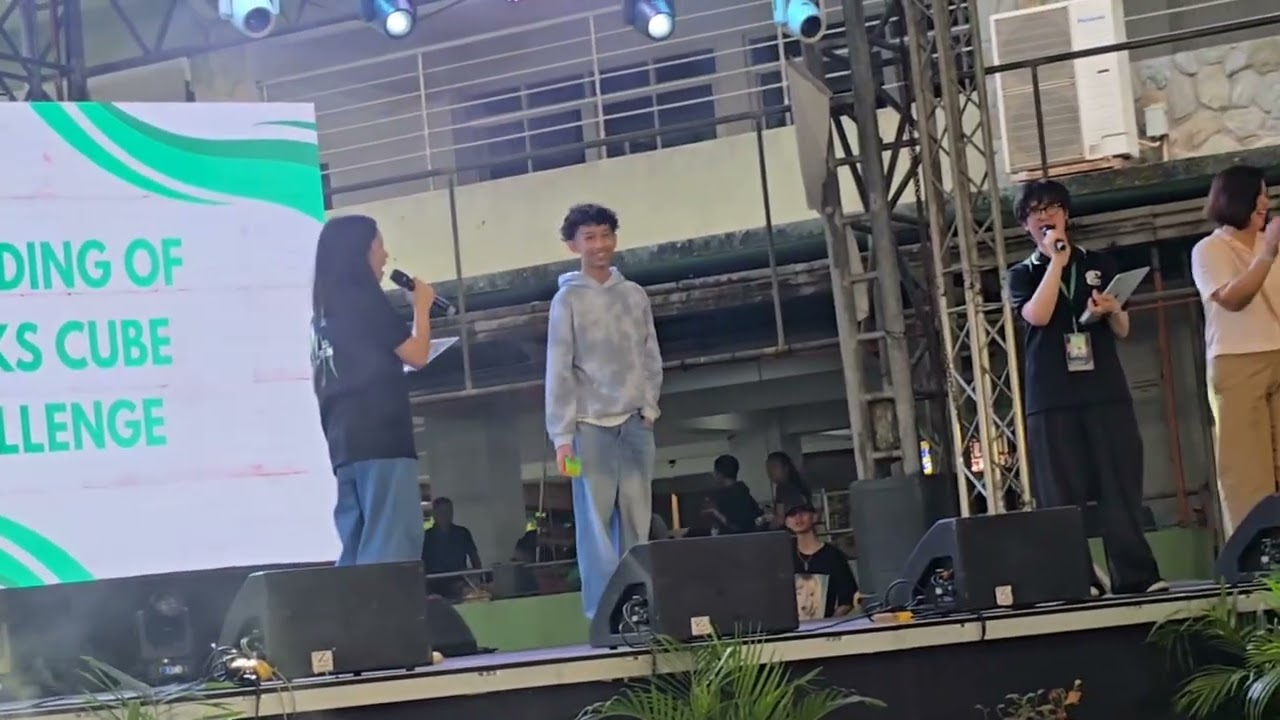 Karl Abarquez takes on the Rubik’s Showdown at the De La Salle Lipa 63rd Foundation Celebration