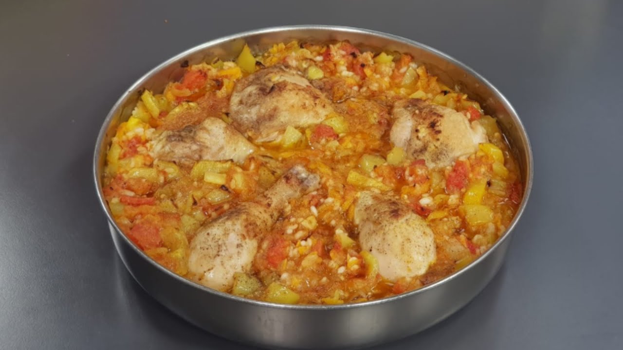 Mish pule në furrë me domate, speca dhe oriz nga zonja Vjollca