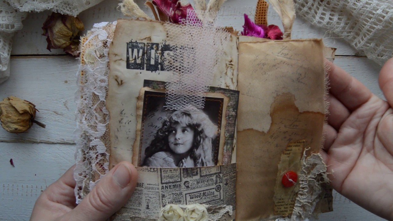 Vintage style junk journal with touch of red.