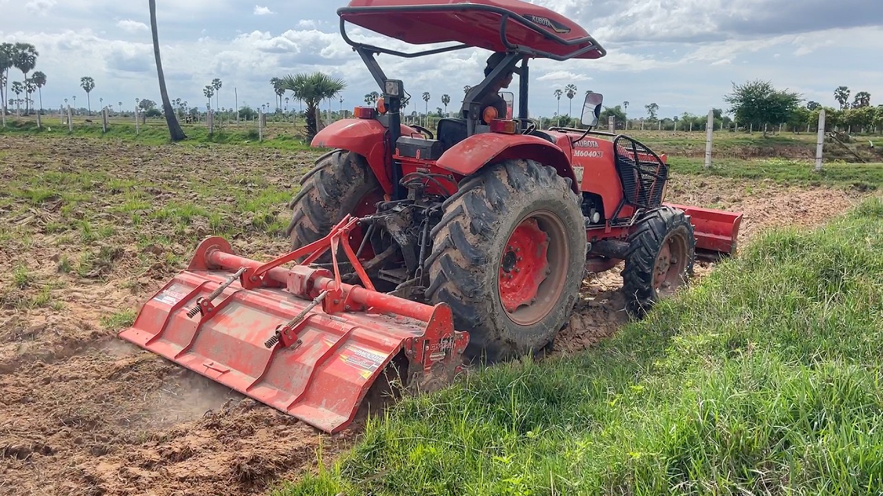 ត្រាក់ទ័រគូបូតាវ៉ៃអង្គប់,Tractor Kubota M6040 SU Plow Field ,Tractor Khmer Farmer