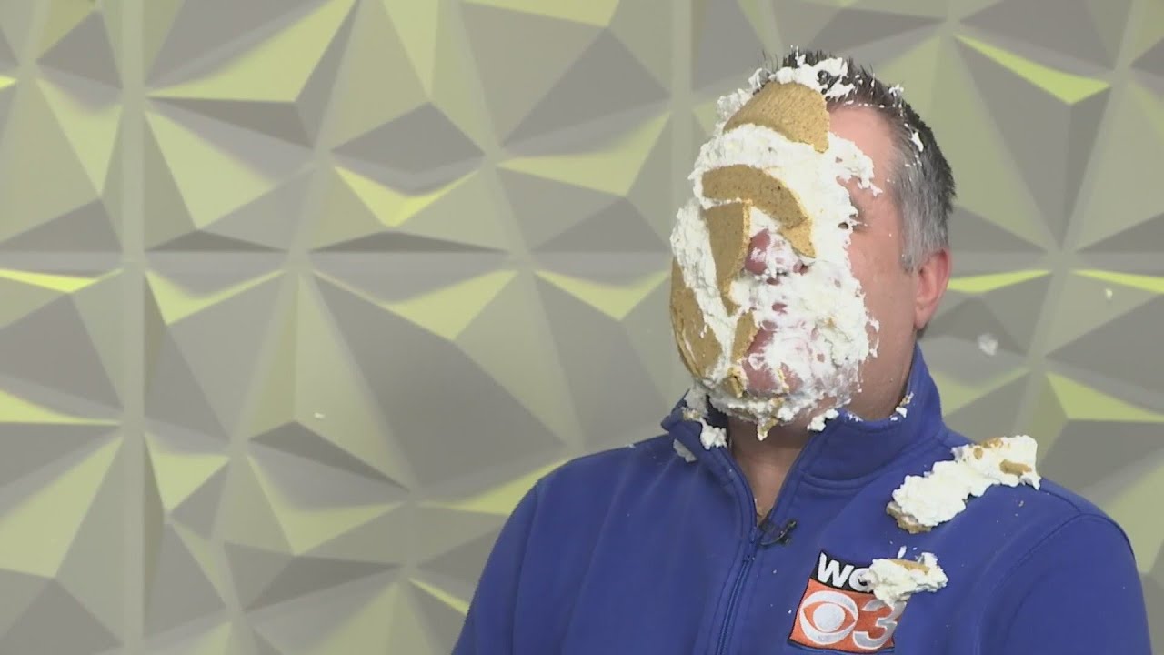 Watch Weatherman Kevin Lighty get pied in the face!