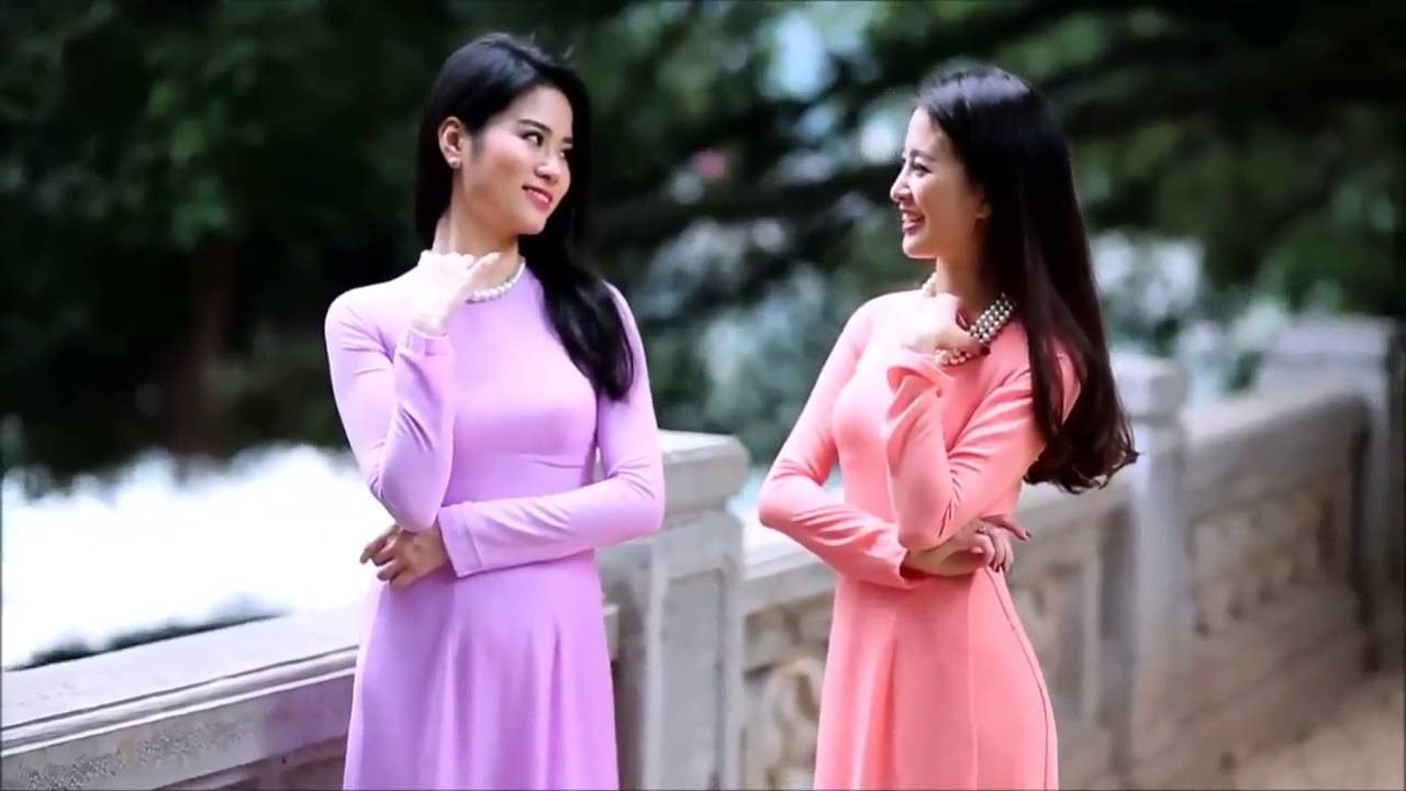 NHỮNG MẪU ÁO DÀI DẠO PHỐ ĐẸP DỊU DÀNG CHO BẠN GÁI
