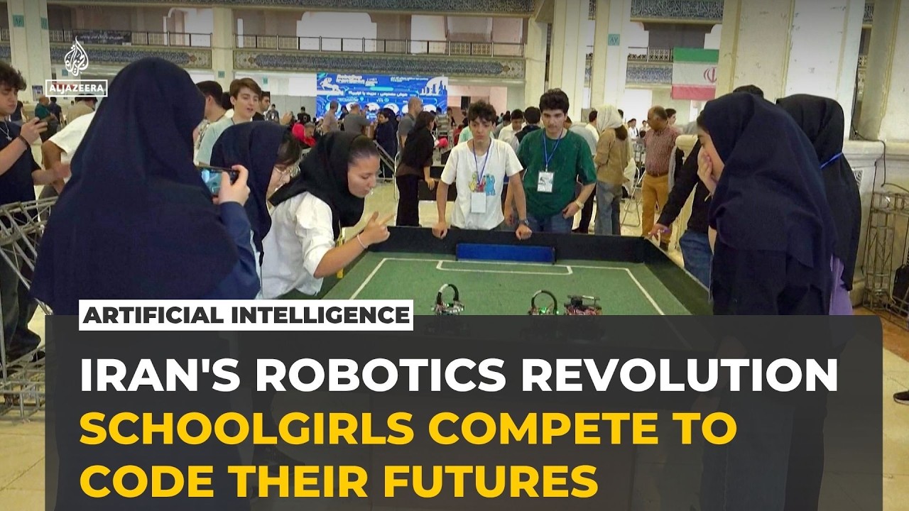 Iranian schoolgirls compete in robot football at Tehran's RoboCup