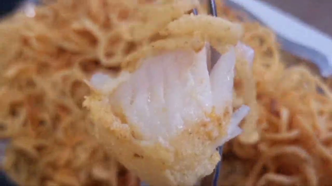 gallo de San Pedro frito con cebolla,  gall amb ceba