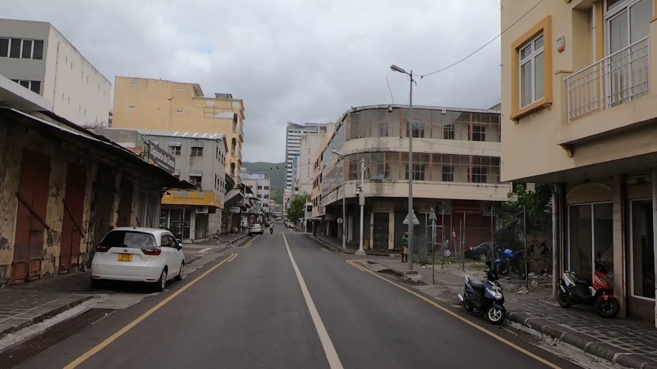 Cycling Port-Louis people scare to work when cloudy since cyclone Belal POV Mauritius