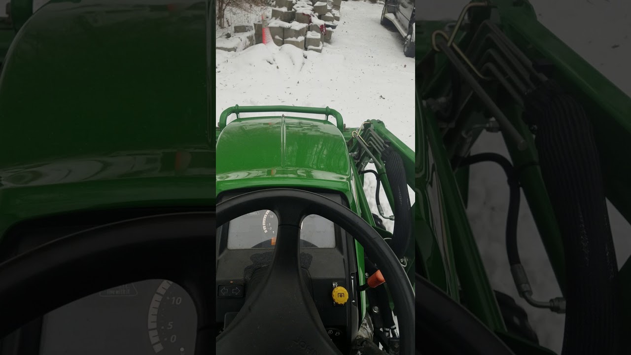John Deere 1026r using float feature plowing