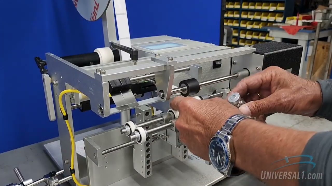 R-310 Semi-Automatic Round Labeling System.