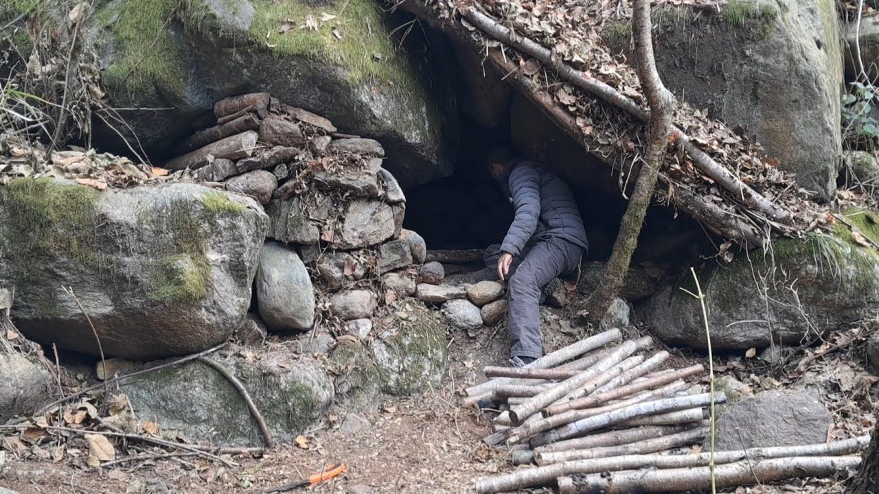 Building a Bushcraft Survival Shelter in the wilderness | Primitive living 