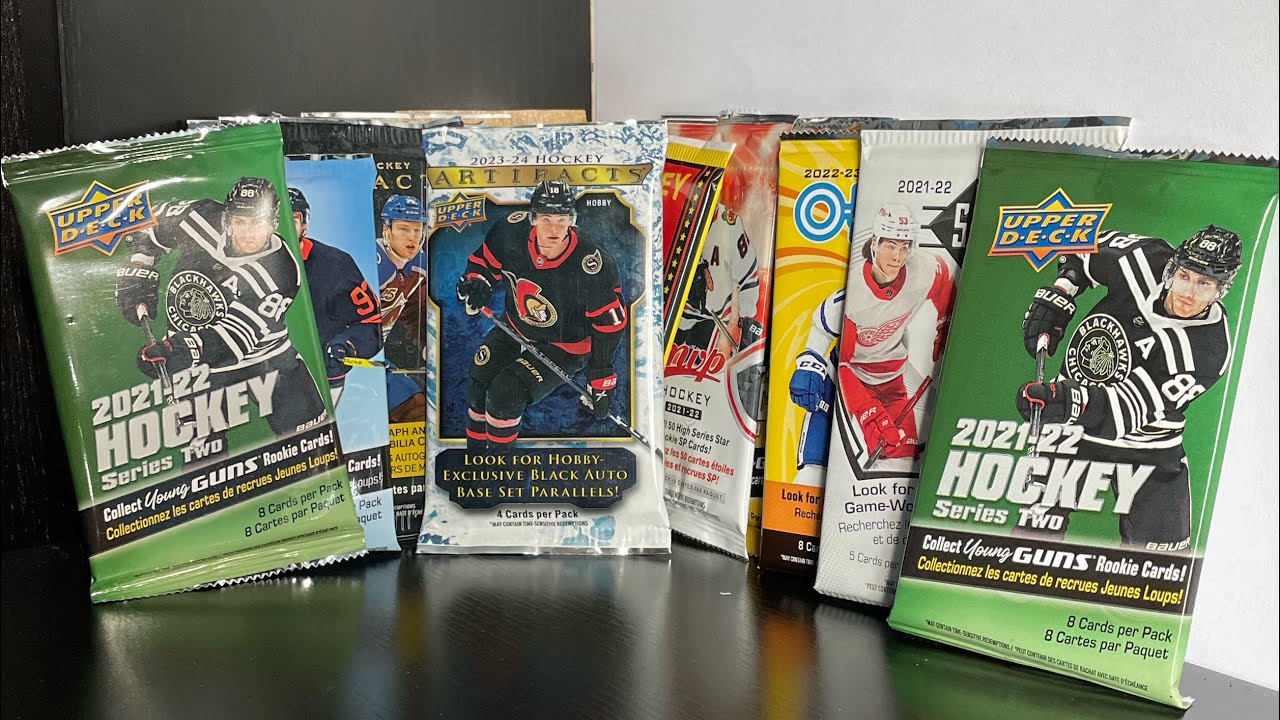Opening 100+ Packs of Hockey Cards Episode 2 The Autofacts!