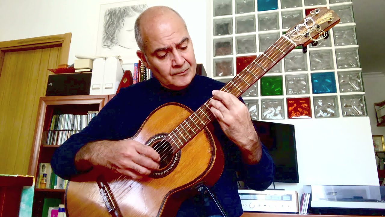 Recuerdos de la Alhambra en una guitarra Andrés Marín (Valencia, c. 1915) con cuerdas de tripa