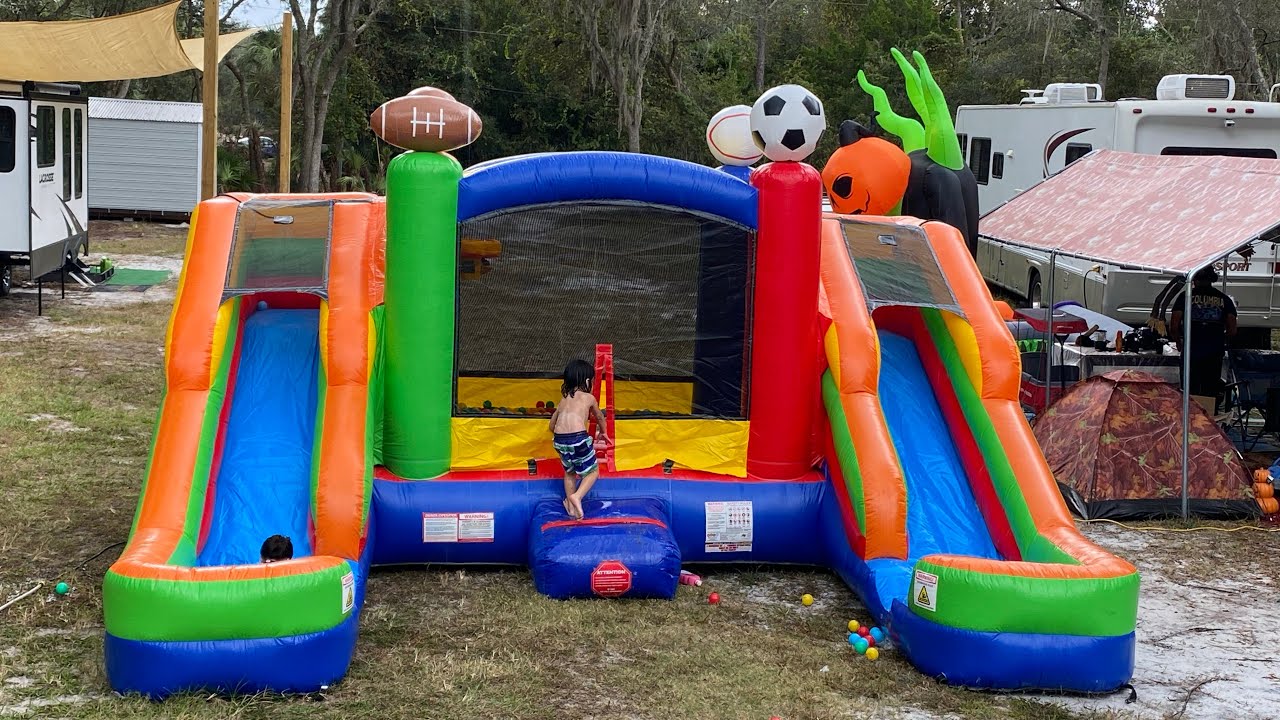 Unboxing and setting up our bounce house with double slides