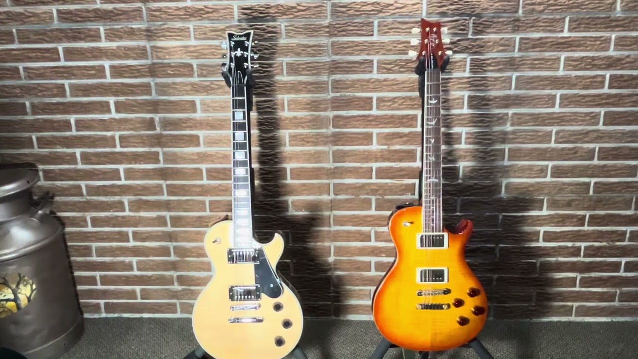 Part 1 of 3 comparing two LP style guitars