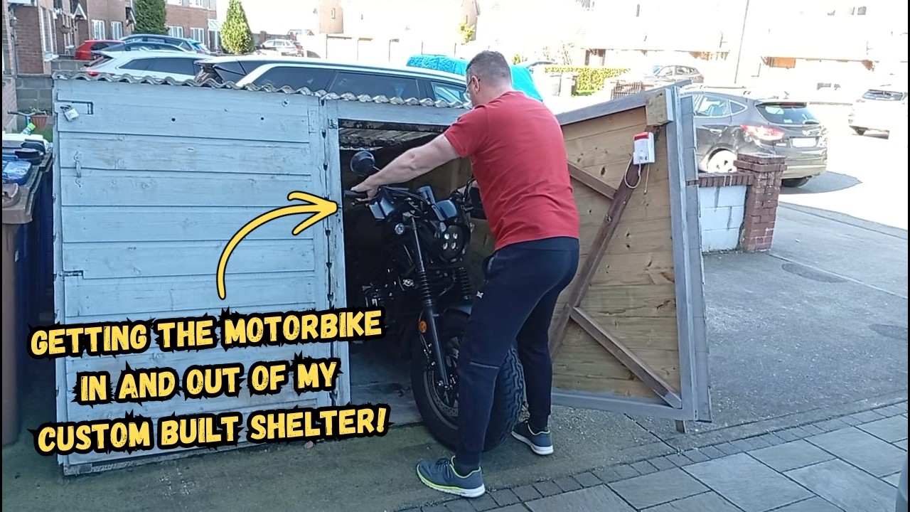 Getting the motorbike in and out of my custom built shelter!