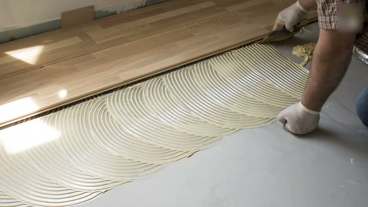 Pose d'un parquet collé DESCHAUMES