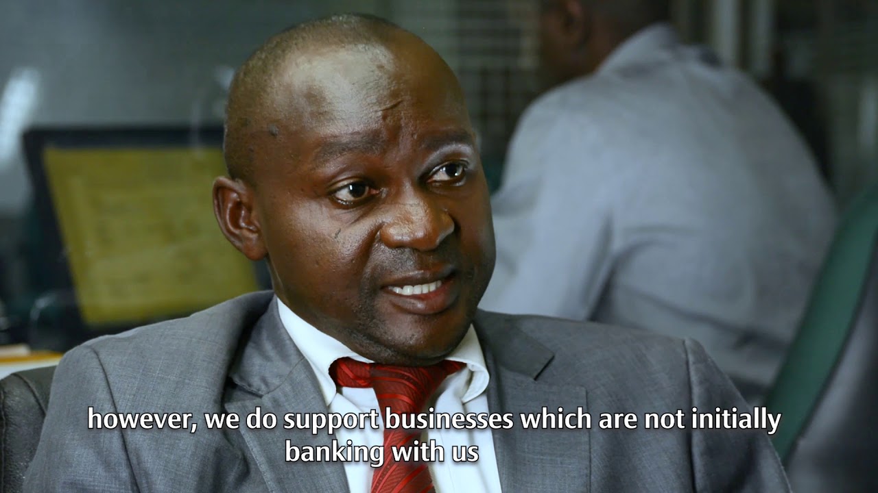 Does Co-op Bank offer loans to businesses that do not bank with them?