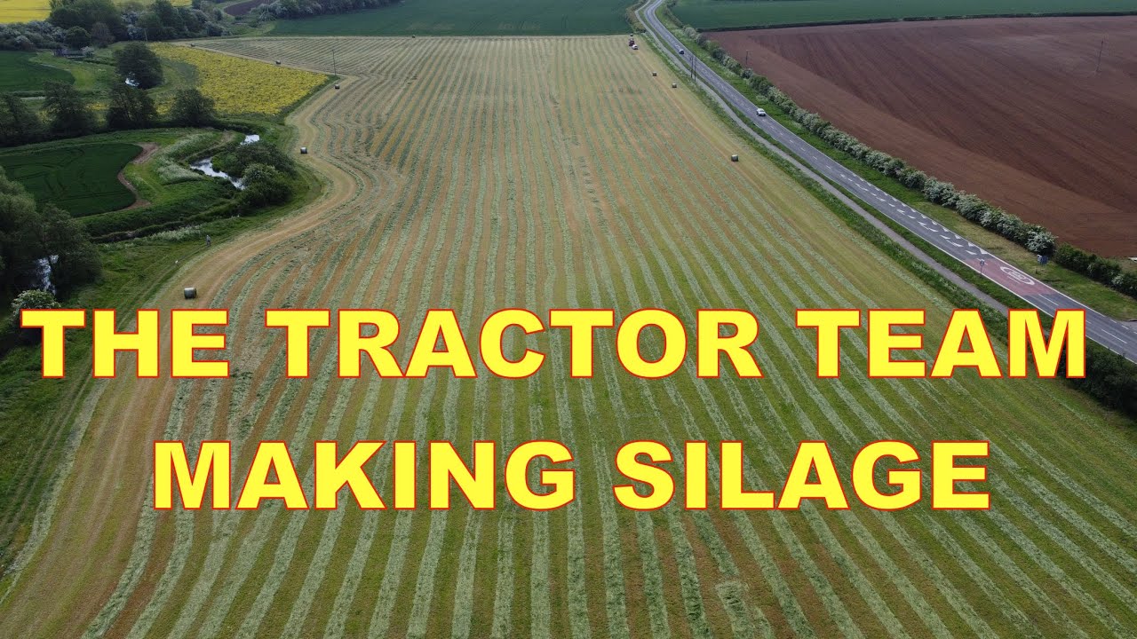 The tractor team making round bale silage.